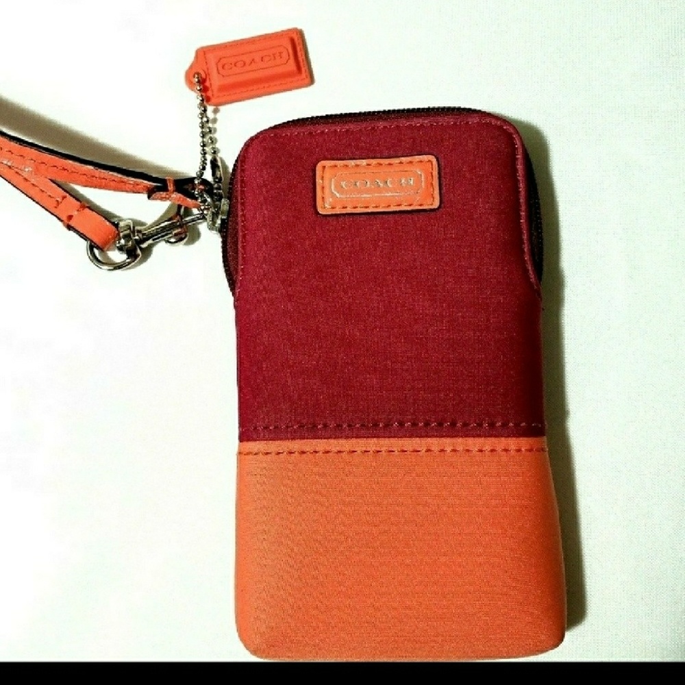 Coach cranberry and orange wristlet nwot